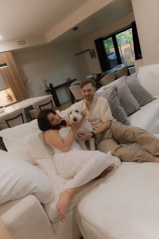Kaylee and David on the couch with Monty