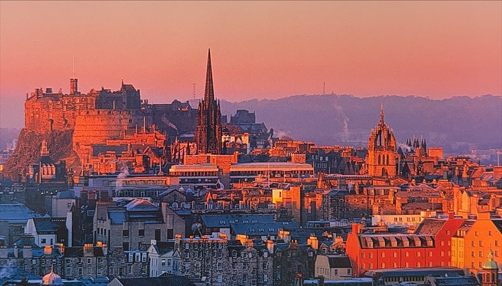 Edinburgh at sunset, the castle and the Old Town spires